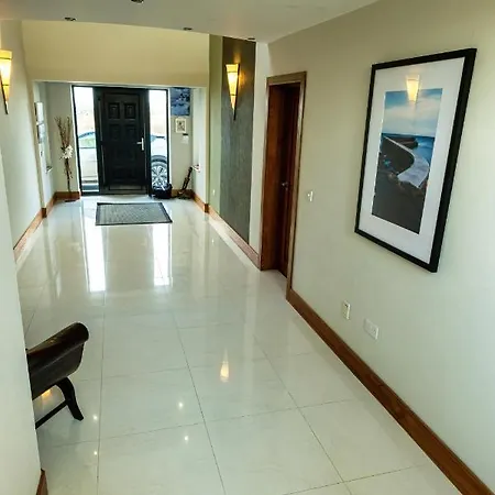 House By The Sea & Golf Course